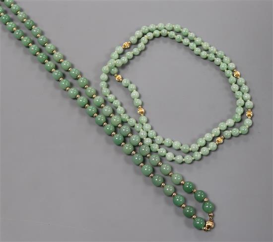 A jade bead necklace comprising 60 uniform beads with yellow metal spacers and another similar necklace.